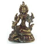 Tibetan patinated bronze figure of Buddha, 12cm high