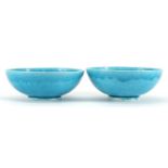 Pair of Chinese porcelain footed bowls having a turquoise glaze, character marks to the base, 17.5cm