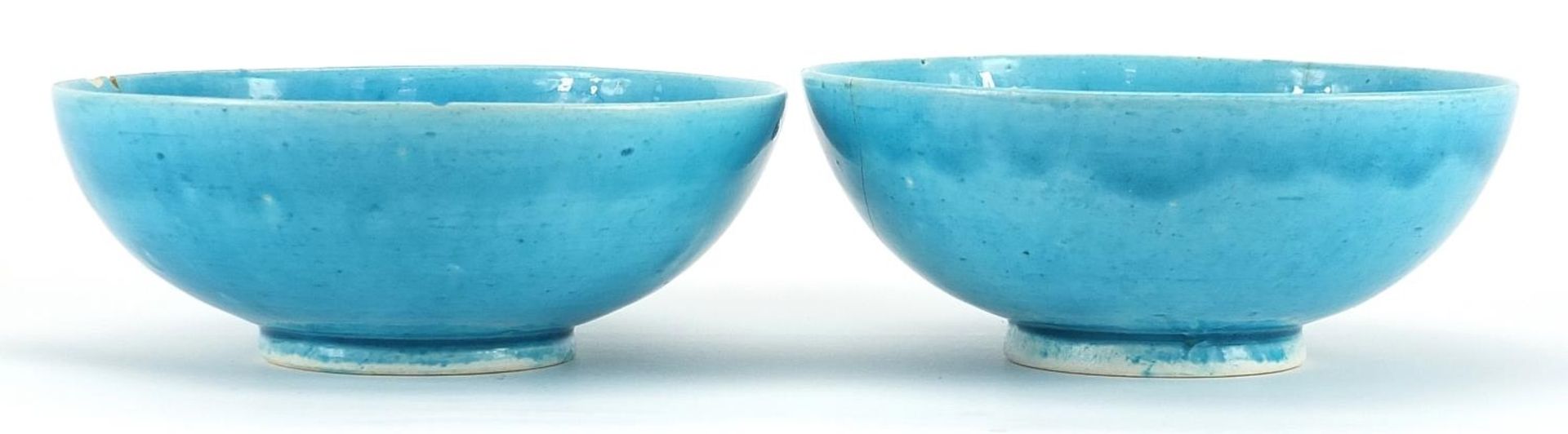 Pair of Chinese porcelain footed bowls having a turquoise glaze, character marks to the base, 17.5cm