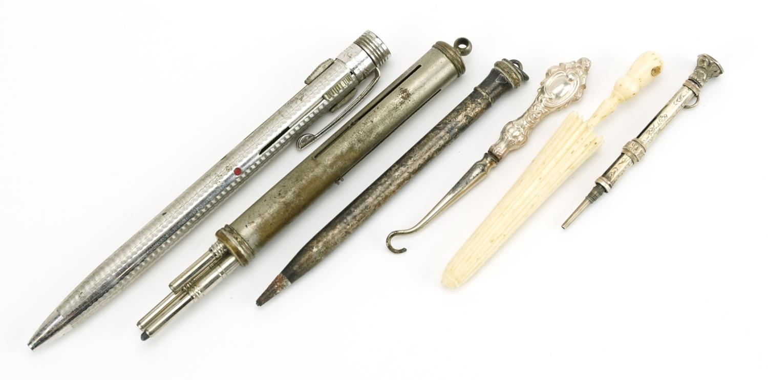 Five antique and later silver and white metal propelling pencils and a bone Stanhope in the form