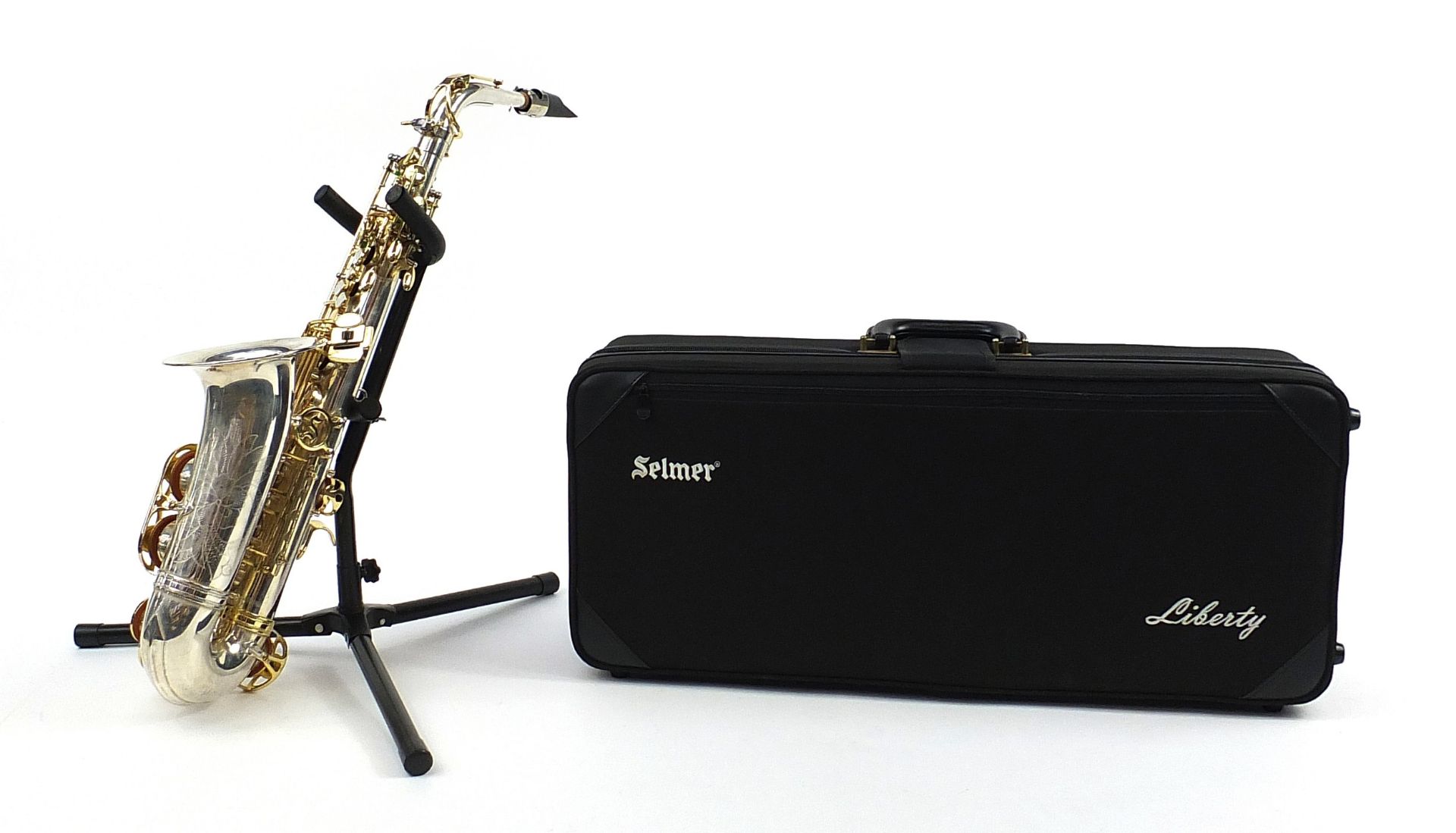 Liberty by Selmer chrome plated and brass alto saxophone with protective carry case and stand, - Image 2 of 7