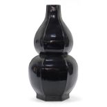 Large Chinese porcelain hexagonal double gourd vase having a black glaze, 64cm high