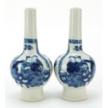 Pair of Chinese blue and white porcelain vases hand painted with figures and Daoist emblems,