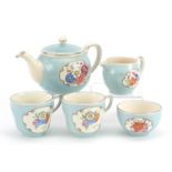 Gray's Pottery Pareek tea for two tea service hand painted with flowers, the teapot 19cm in length