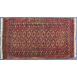 Rectangular Bokhara pink ground rug having an all over geometric design, 190cm x 104cm