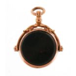 9ct rose gold bloodstone spinner fob, Chester 1928, 3.8cm high, 4.8g