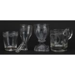 Four 18th century glasses including a stirrup cup and handled cup with engraved initials, the