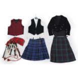 Set of Scottish bagpipes with two kilts and a suit