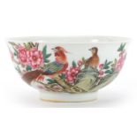 Chinese porcelain bowl hand painted in the famille rose palette with birds amongst flowers, four
