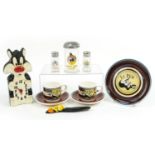 Vintage and later Looney Tune objects including Le Pew cups and saucers, sugar sifter and