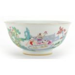 Chinese porcelain bowl hand painted with children playing in a palace setting, four figure character