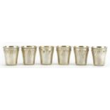 Set of six French silver liqueur cups with gilt interiors, each 4.5cm high, total 106.0g