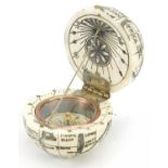 Sailor's style carved bone pocket globe compass, 4cm in diameter