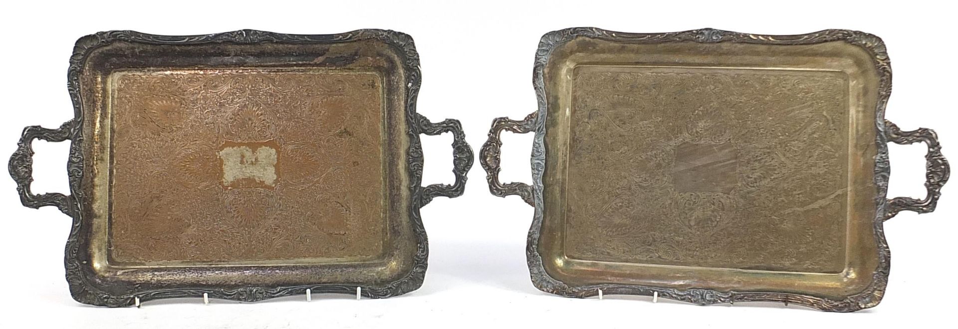 Pair of heavy silver plated trays with twin handles, 60cm wide