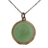 Unmarked silver and guilloche enamel locket on an unmarked silver necklace housed in a Harrods