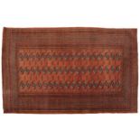 Rectangular Bokhara red ground rug having an all over geometric design, 180cm x 128cm