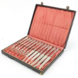 Set of six silver plated fish knives and forks housed in a fitted case, the knives 17.5cm in length