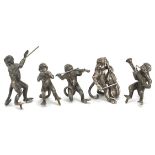 Five novelty white metal monkey musicians, the largest 6.5cm high