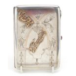 Russian silver cigarette case with applied yellow metal lettering and cabochon pink stone push