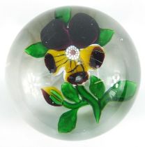 19th century Baccarat floral glass paperweight with paper label inscribed 199 to the base,