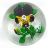 19th century Baccarat floral glass paperweight with paper label inscribed 199 to the base,