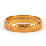 22ct gold wedding band engraved with flower heads, size N, 3.7g