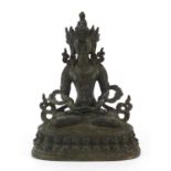Chino Tibetan patinated bronze figure of seated Buddha, 29.5cm high