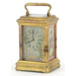 Miniature brass cased carriage clock with Sevres style panels hand painted with females, 7cm high