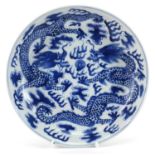 Chinese blue and white porcelain shallow dish hand painted with dragons chasing a flaming pearl