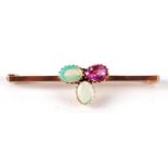 9ct gold ruby and opal bar brooch housed in a tooled leather box, 4.3cm wide, 2.8g