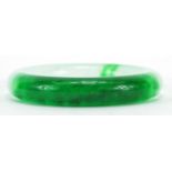 Chinese green jade bangle, 8.5cm in diameter, 93.0g