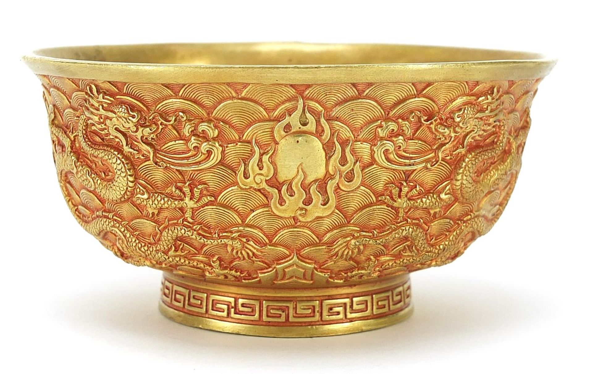 Chinese gilt bronze footed bowl cast with dragons amongst clouds chasing flaming pearls, four figure - Image 2 of 4