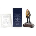 Ashmore for Worcester porcelain commemorative military figure raised on a wooden plinth base, with
