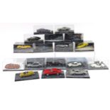Seventeen 007 James Bond diecast vehicles, some with display cases by Universal Hobbies