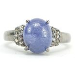 Silver cabochon tanzanite and diamond ring, the tanzanite approximately 5.50 carat, total diamond