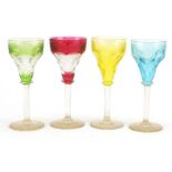 Set of four Bohemian flashed cut glasses etched with leaves and berries, each 15cm high