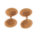 Pair of 9ct gold cufflinks with engraved decoration housed in a fitted leather box, 1.7cm wide, 3.6g