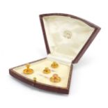 Set of 9ct gold gentlemen's dress studs housed in a fitted tooled leather box, 3.2g