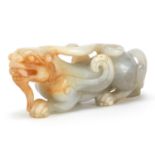 Chinese russet and white jade carving of a dragon, 11cm in length
