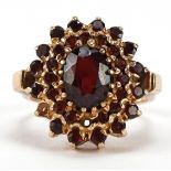 9ct gold garnet three tier cluster ring, size J/K, 5.0g