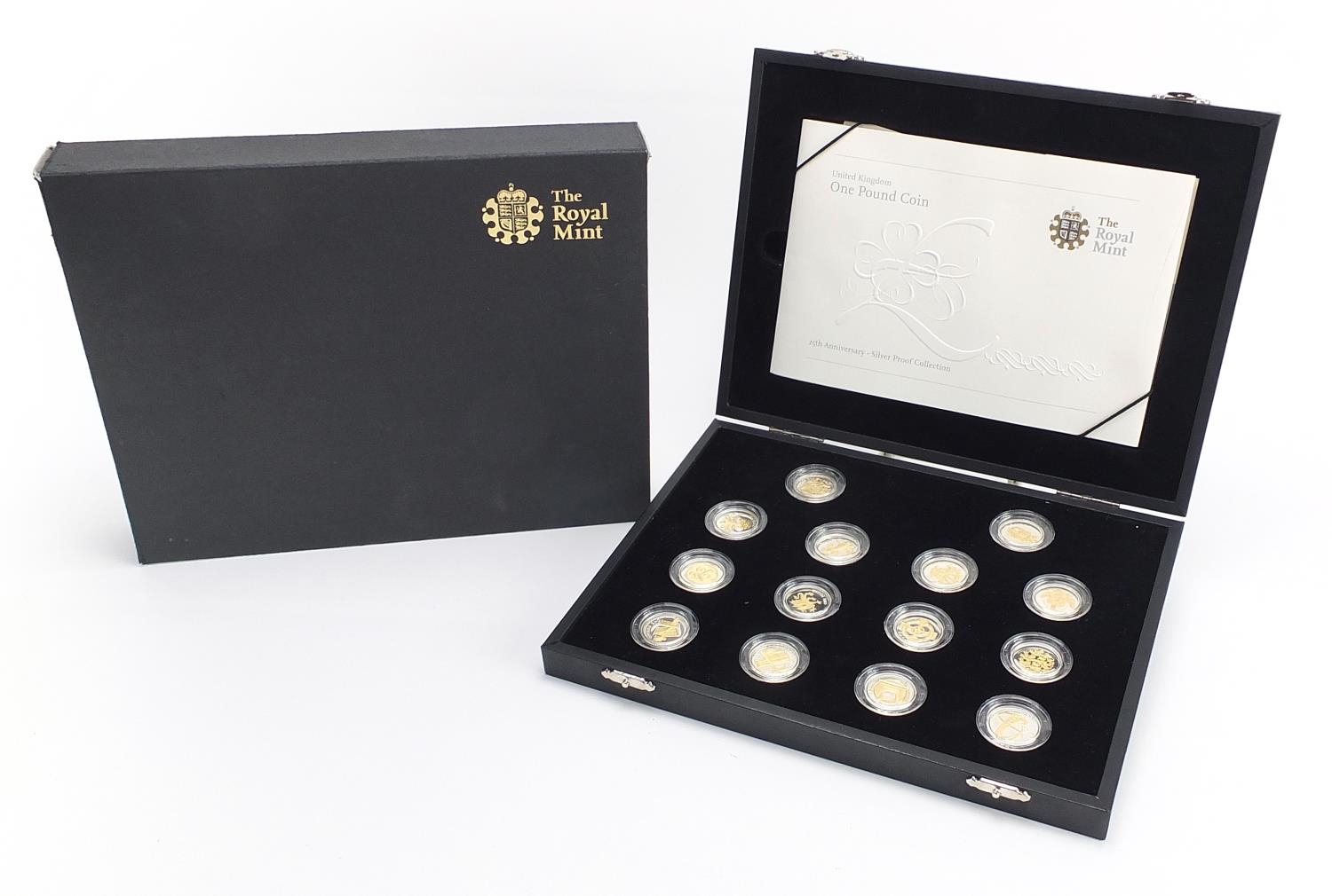 United Kingdom one pound coin 25th Anniversary Silver Proof Collection arranged in a fitted case