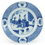 Chinese blue and white porcelain plate hand painted with two attendants in a palace setting,