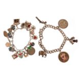 Two silver charm bracelets with a selection of mostly silver charms including Punch & Judy, elephant