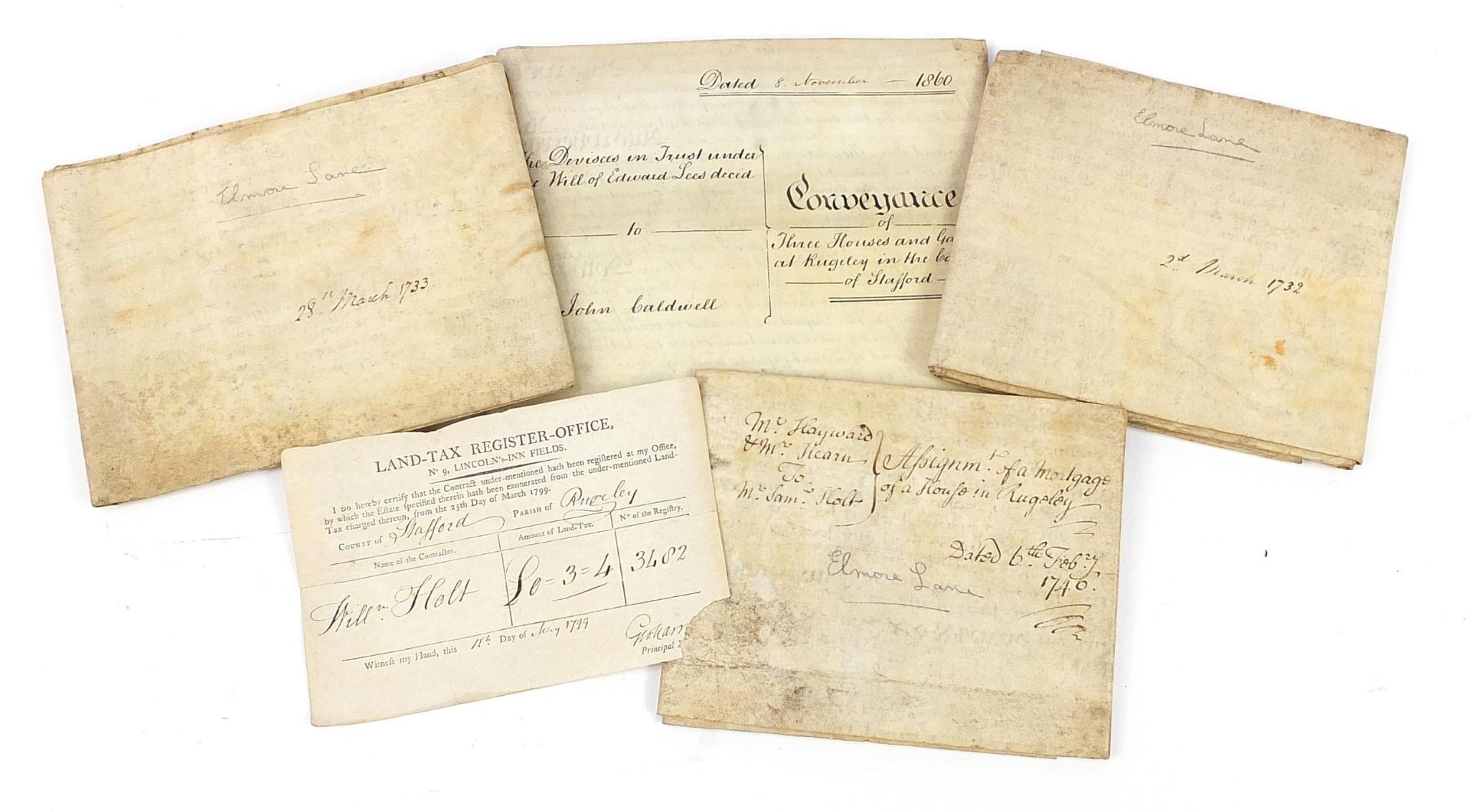 Four antique vellum documents and a land tax register document