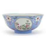 Chinese porcelain mauve ground bowl hand painted in the famille rose palette with panels of flowers,