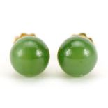 Pair of unmarked 14ct gold jade ball stud earrings, 7mm in diameter, 3.0g