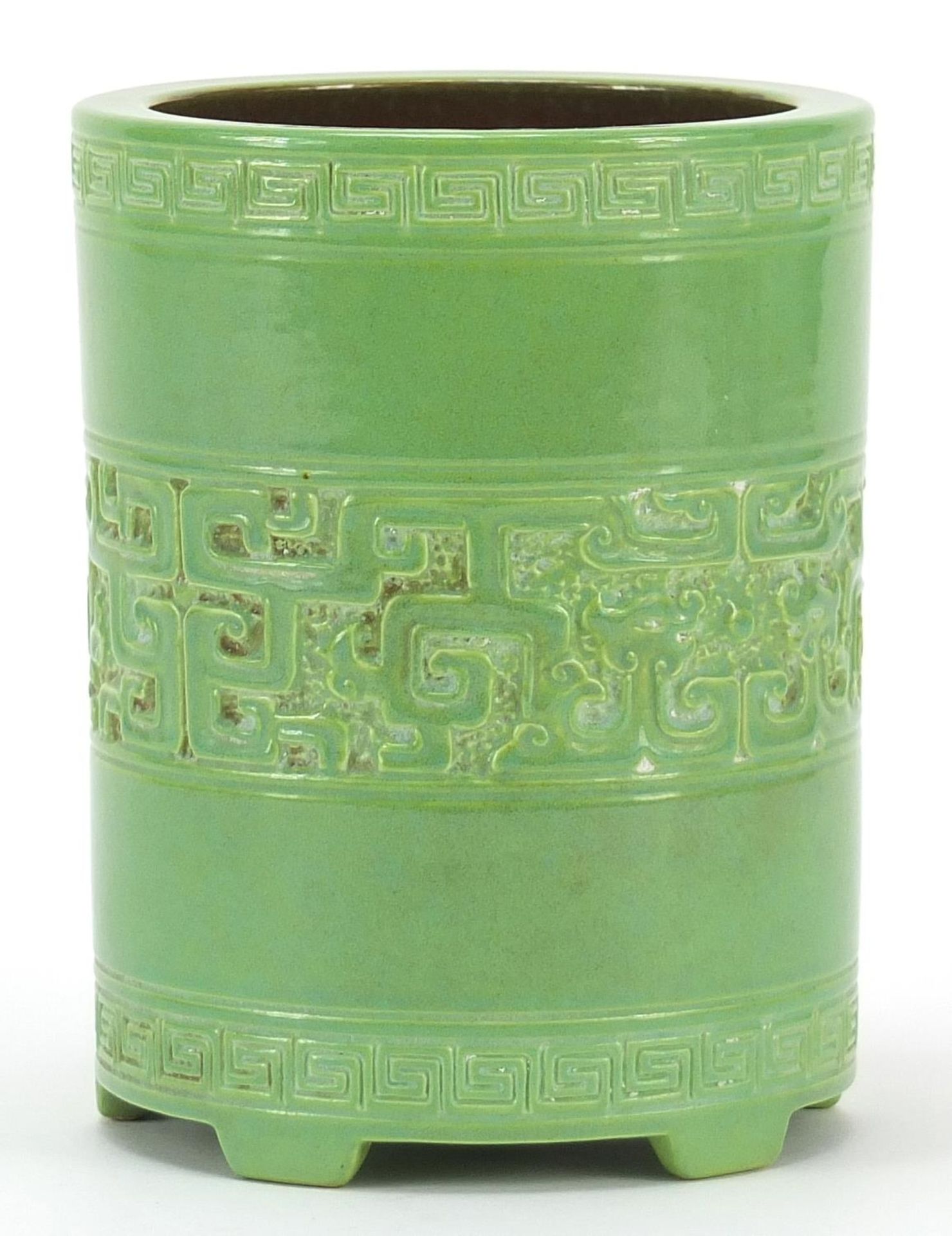 Chinese green glazed porcelain brush pot incised with archaic motifs and mythical animals, impressed