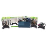 X Box One S games console with controllers and a collection of X Box and X Box 360 games