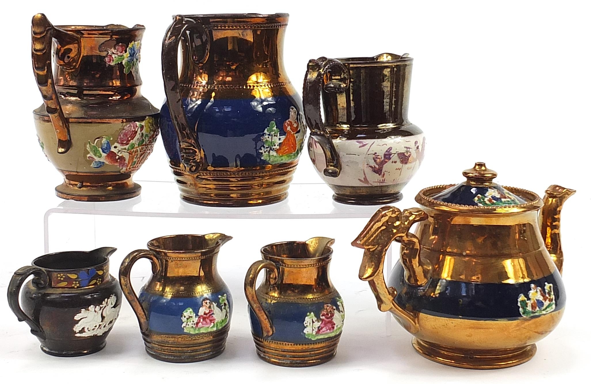 Six Victorian copper lustre pottery jugs and teapot, each decorated in relief with a girl with a cat - Bild 3 aus 4