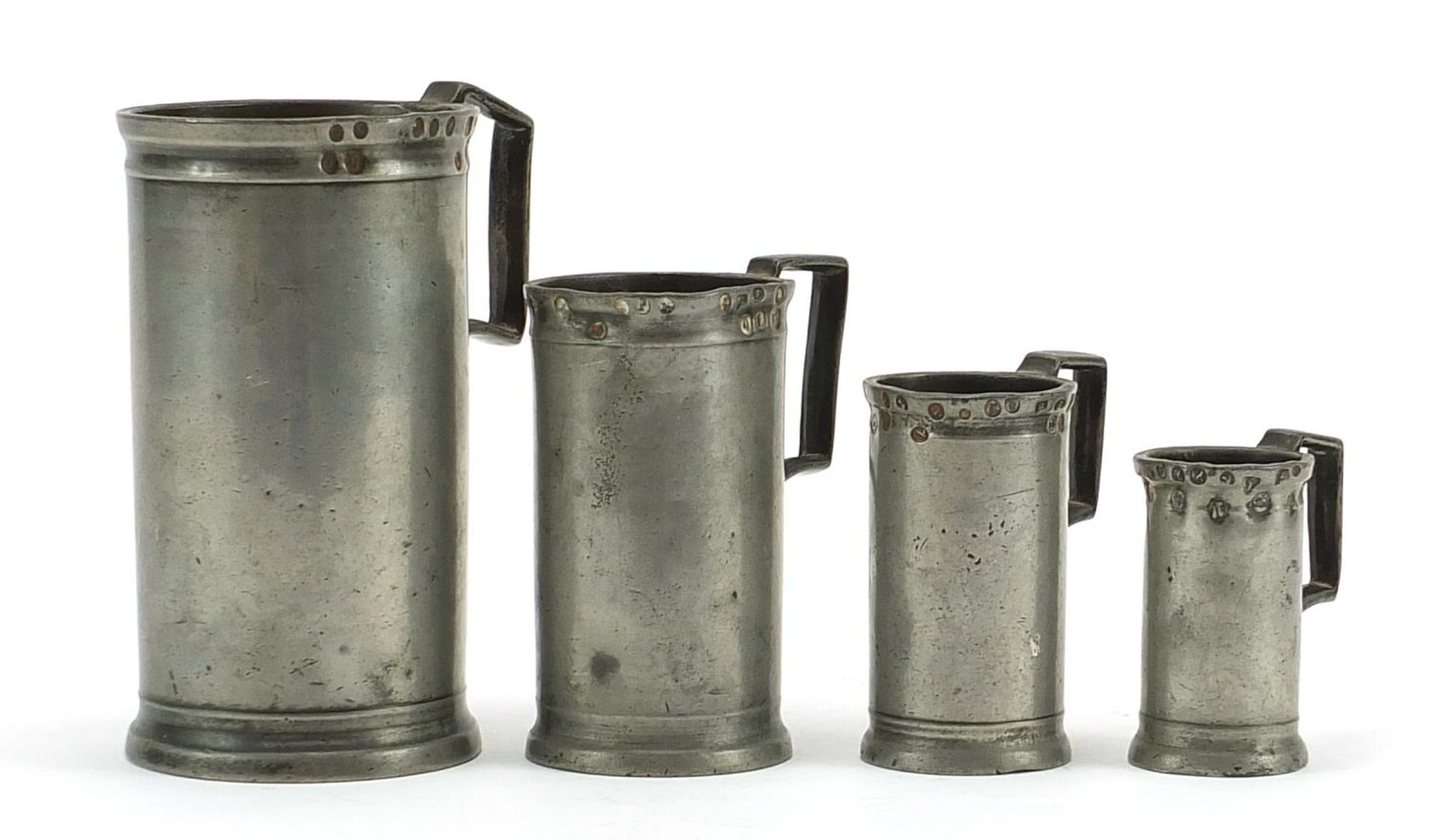 Graduated set of four antique pewter measures, indistinct maker's mark to each, possibly Dewitte